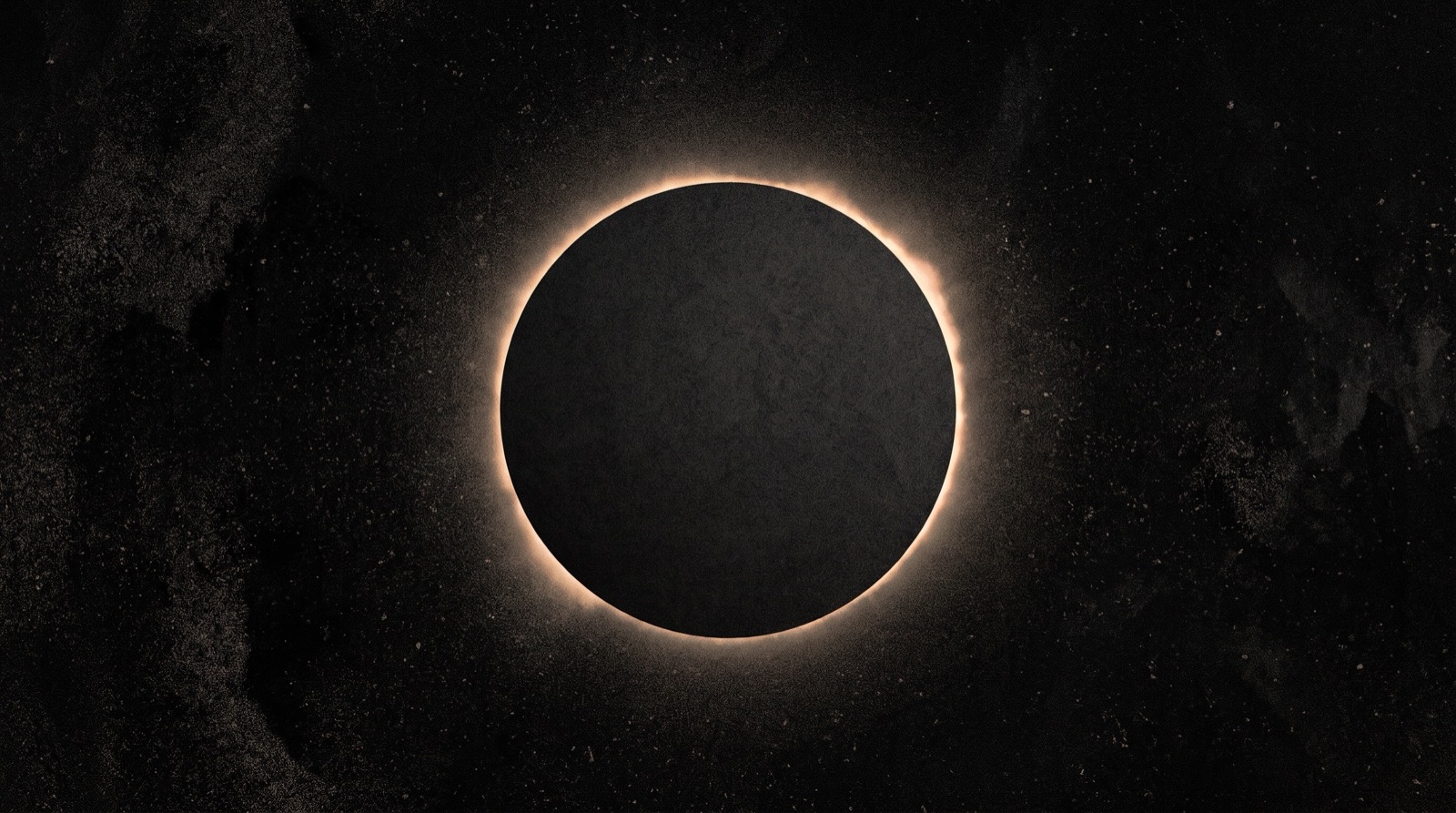 Une éclipse totale seule dans un espace noir et granuleux, un mince anneau de lumière autour d'un disque sombre
